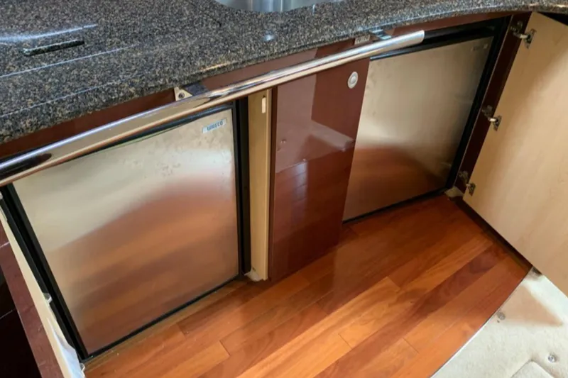Slide: The Image of Luxury kitchen area in 2007 Sea Ray 52 Sundancer yacht with granite countertop. - 12