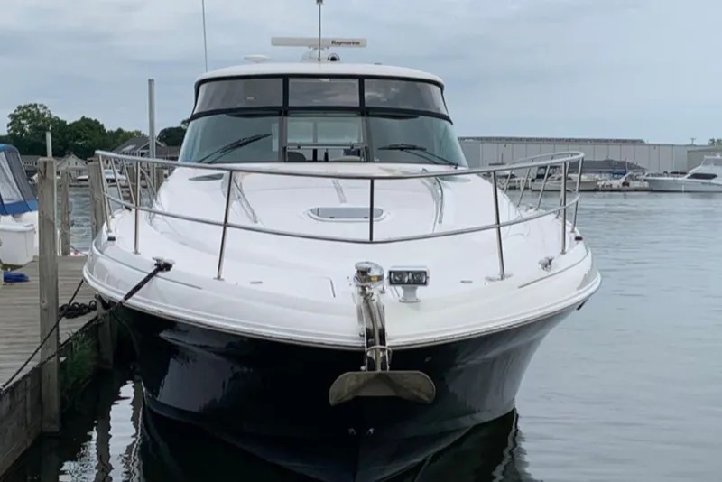 Slide: The Image of 2007 Sea Ray 52 Sundancer yacht docked at marina, front view. - 1