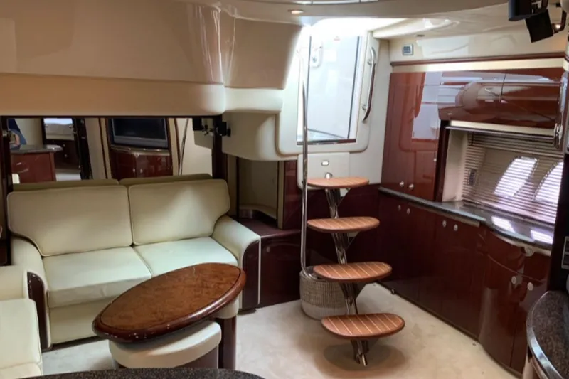 Slide: The Image of Luxurious interior of a 2007 Sea Ray 52 Sundancer yacht with elegant seating and wooden accents. - 10