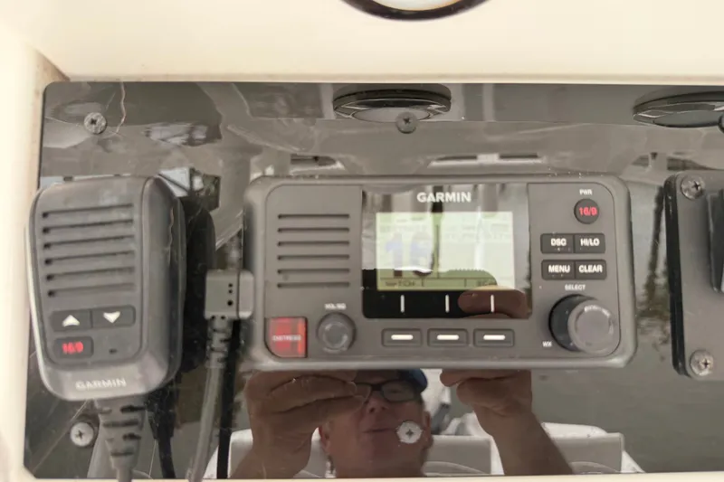 Slide: The Image of Garmin marine radio on 2025 Sea Hunt BX25FS boat dashboard. - 15