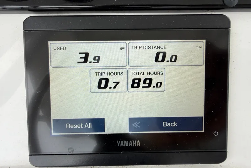 Slide: The Image of Yamaha display showing fuel usage and trip data on Sea Hunt BX25FS boat. - 9