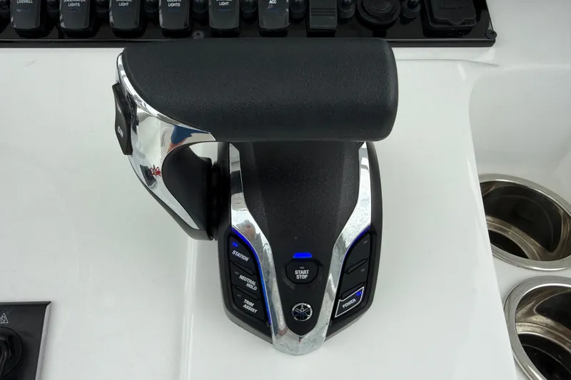 Slide: The Image of Throttle control of 2025 Sea Hunt BX25FS boat with modern design and functionality. - 12