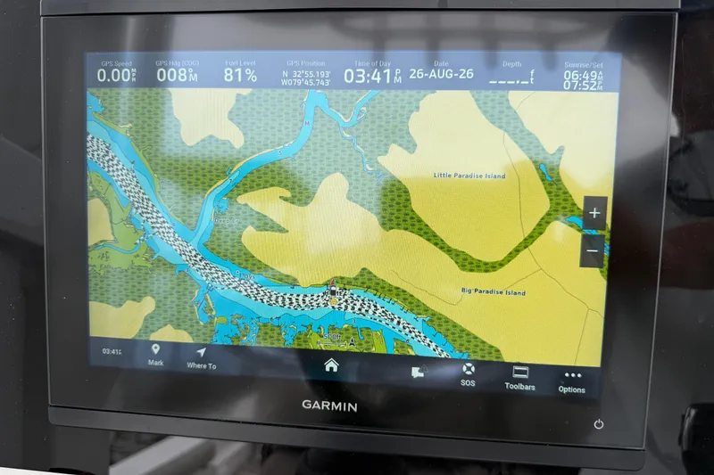 Slide: The Image of Garmin GPS display on Sea Hunt BX25FS boat, showing navigation map and coordinates. - 10