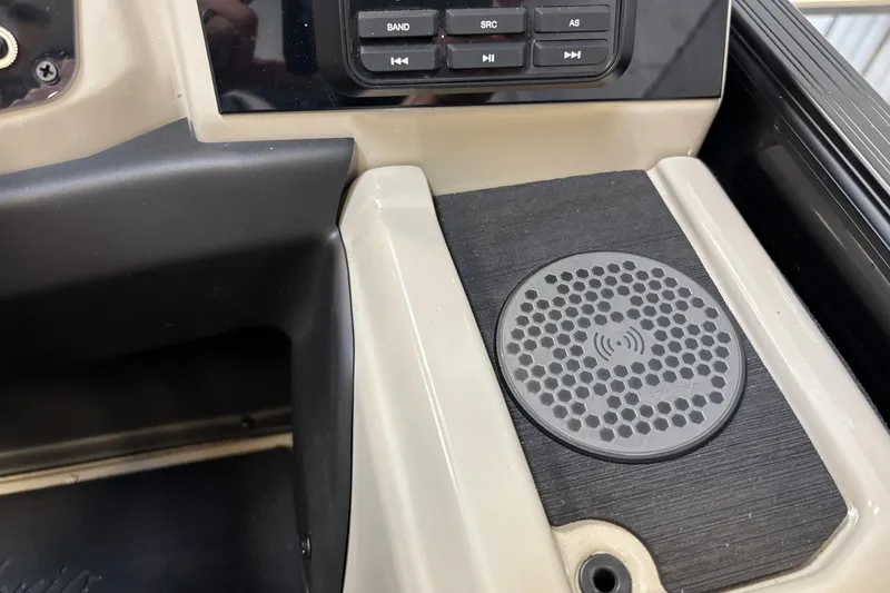 Slide: The Image of Control panel of 2023 Barletta Cabrio 22QC with wireless charging pad and audio controls. - 18