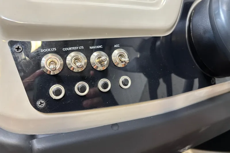 Slide: The Image of Control panel of 2023 Barletta Cabrio 22QC with labeled switches for lights and accessories. - 15