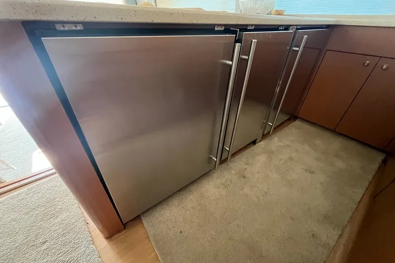 Slide: The Image of Stainless steel kitchen appliances on 2004 Ocean Yacht 52 Super Sport. - 7