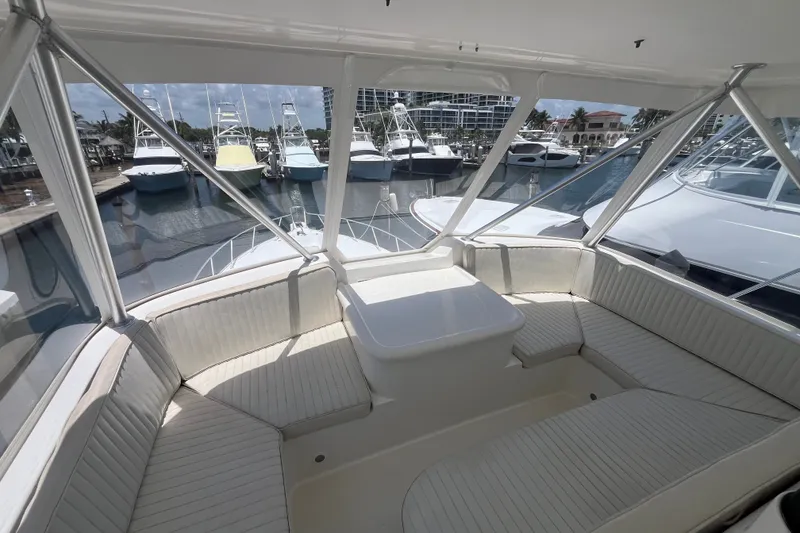 Slide: The Image of Luxurious interior of a 2004 Ocean Yacht 52 Super Sport at a marina. - 29