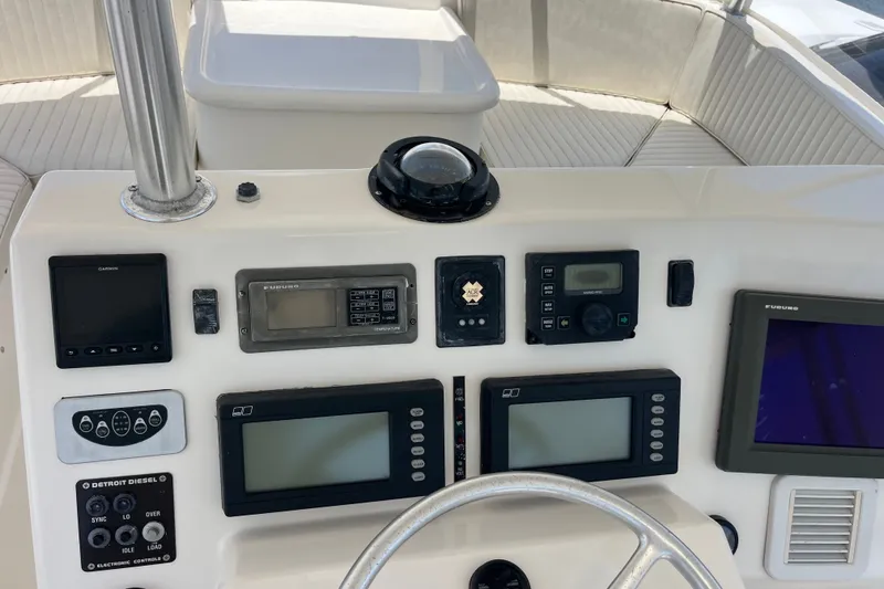 Slide: The Image of Control panel of a 2004 Ocean Yacht 52 Super Sport with navigation instruments. - 27