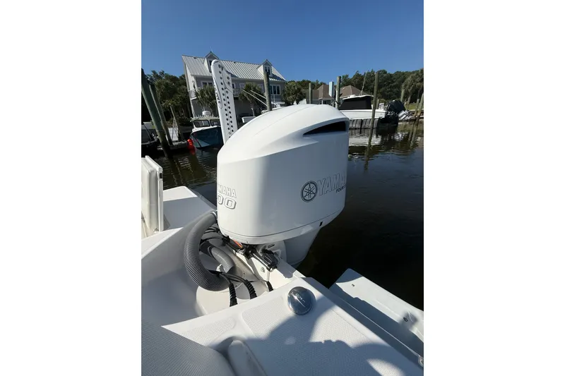 Slide: The Image of 2020 Everglades 243 Center Console boat with Yamaha outboard motor at marina. - 16
