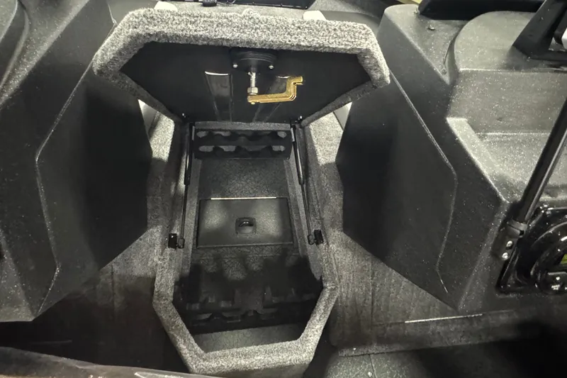 Slide: The Image of Interior view of 2027 Tracker Targa V-18 Combo boat storage compartment. - 16