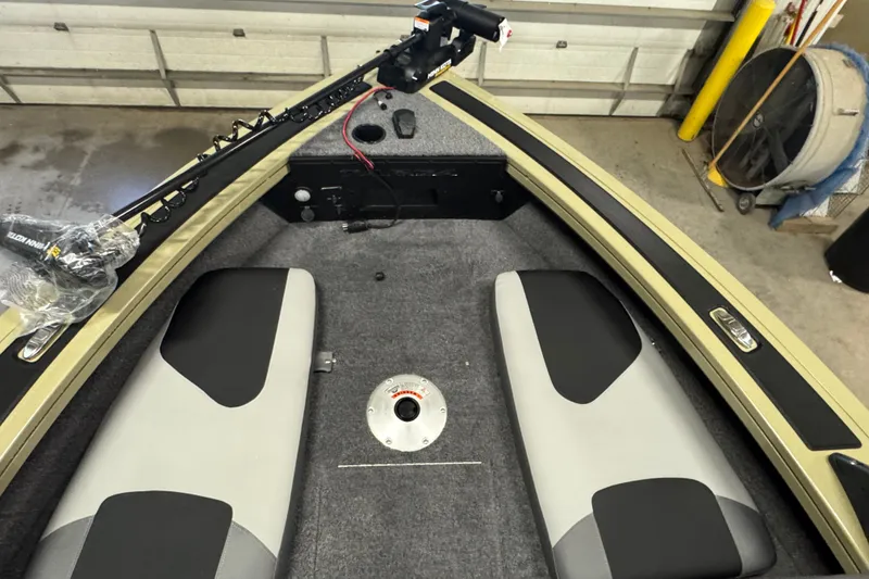 Slide: The Image of 2027 Tracker Targa V-18 Combo boat interior with seating and equipment. - 17