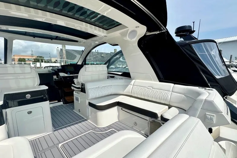 Slide: The Image of Luxurious interior of 2022 Sea Ray Sundancer 370 Outboard with elegant seating and modern design. - 10
