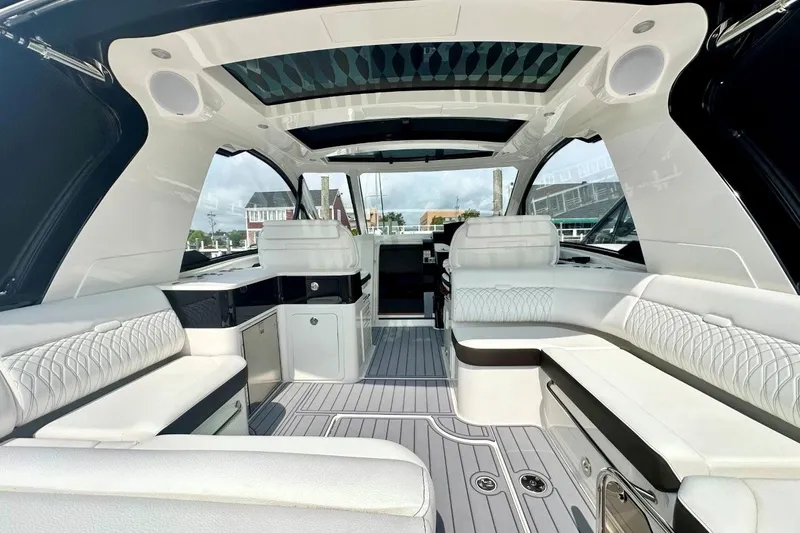 Slide: The Image of Luxurious interior of 2022 Sea Ray Sundancer 370 Outboard with elegant seating and modern design. - 8