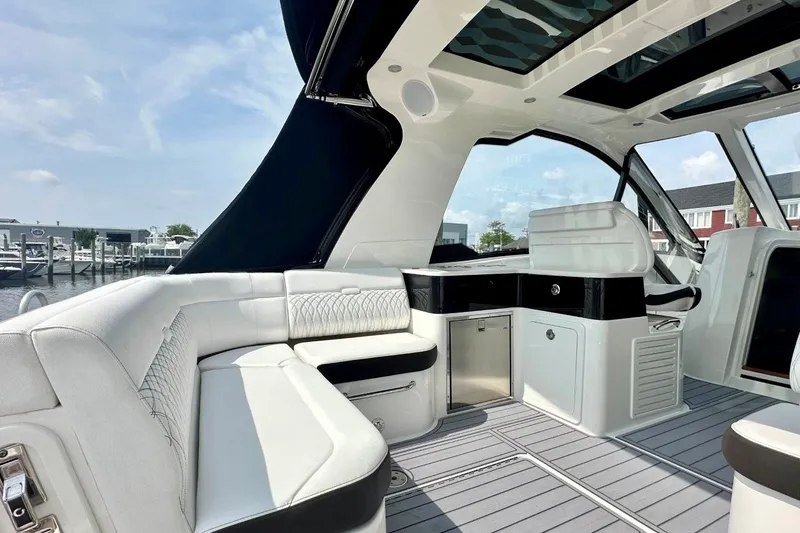 Slide: The Image of Luxurious interior of 2022 Sea Ray Sundancer 370 Outboard with elegant seating and modern design. - 9