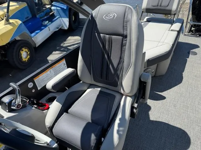 Slide: The Image of Captain's seat on 2025 Barletta CORSA 25MA boat, featuring sleek design and comfortable upholstery. - 24