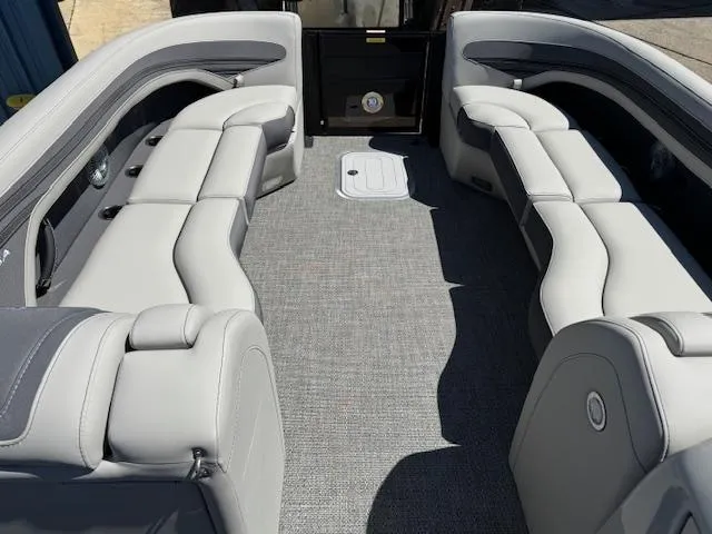 Slide: The Image of 2025 Barletta CORSA 25MA boat interior with luxurious gray seating and spacious layout. - 17