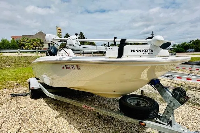 Slide: The Image of 2011 Boston Whaler 170 Super Sport on trailer with Minn Kota Maxxum motor. - 2