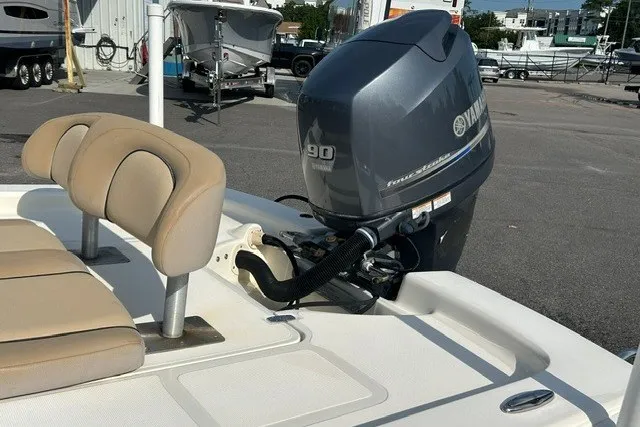 Slide: The Image of 2016 Scout 177 Sport boat with Yamaha 90 horsepower outboard motor, beige seating. - 4