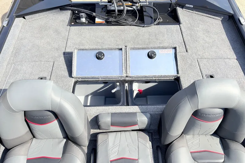 Slide: The Image of 2024 Tracker Pro Team 195 TXW Tournament Edition boat interior with seating and storage compartments. - 34