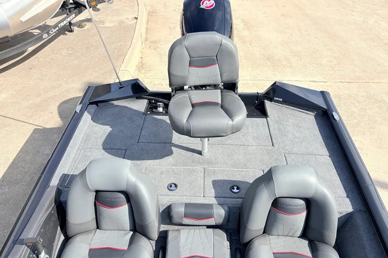 Slide: The Image of 2024 Tracker Pro Team 195 TXW Tournament Edition boat interior with gray seating. - 32