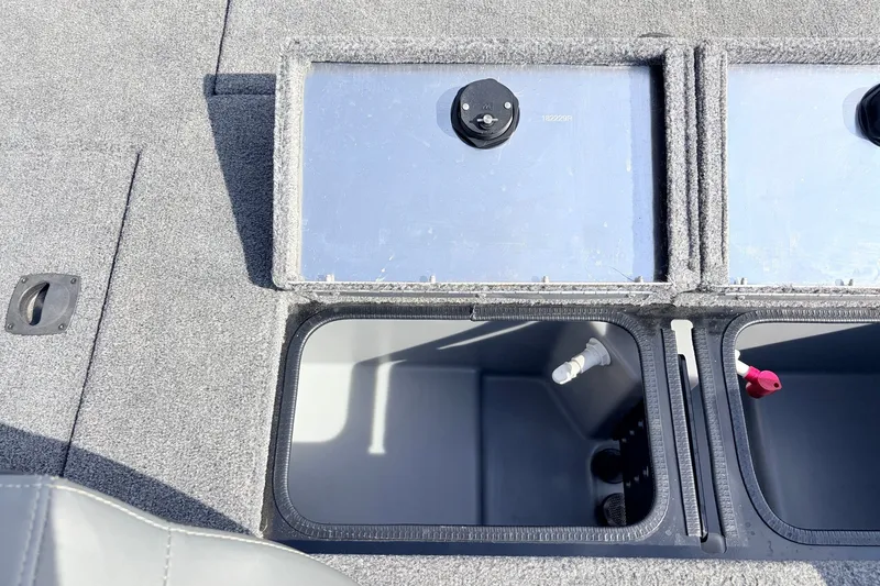 Slide: The Image of 2024 Tracker Pro Team 195 TXW Tournament Edition boat storage compartments. - 35