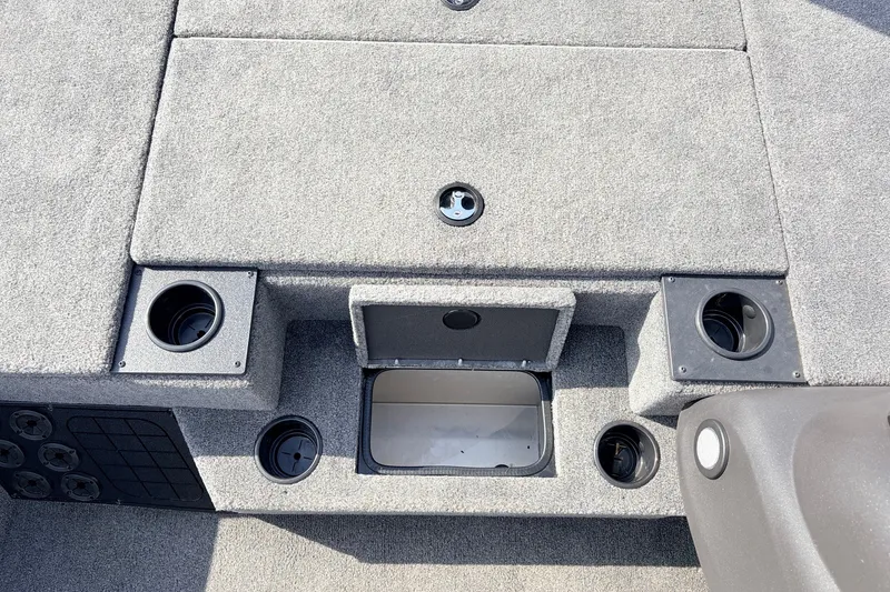 Slide: The Image of 2024 Tracker Pro Team 195 TXW Tournament Edition boat interior with storage compartments. - 23