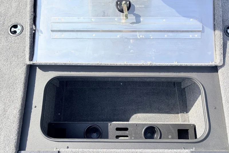 Slide: The Image of 2024 Tracker Pro Team 195 TXW Tournament Edition storage compartment, open and empty. - 20