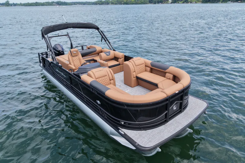 The Image of 2026 South Bay 524sb2 pontoon boat with luxurious seating on a serene lake. - 0