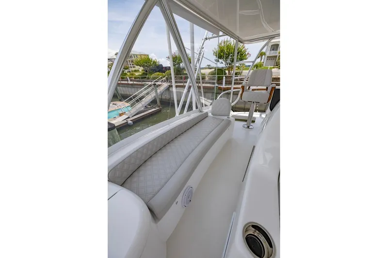 Slide: The Image of 2025 Viking 58 Convertible yacht interior with elegant seating and modern design. - 24