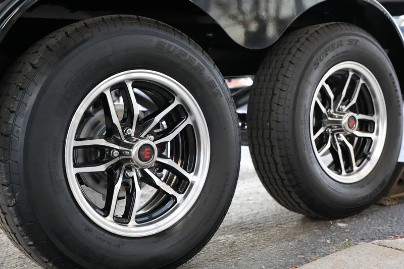 Slide: The Image of Close-up of 2026 Supreme S220 wheels with black and silver alloy rims. - 6