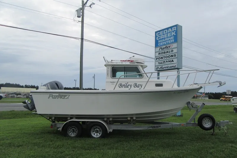 The Image of 2016 Parker 2120 Sport Cabin boat on trailer at Cedar Creek Marine Center. - 0