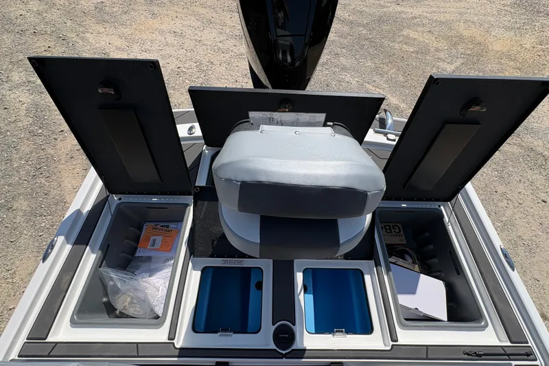 Slide: The Image of Open storage compartments on a 2027 Nitro Z20 XL Pro boat, showcasing organized interior space. - 15