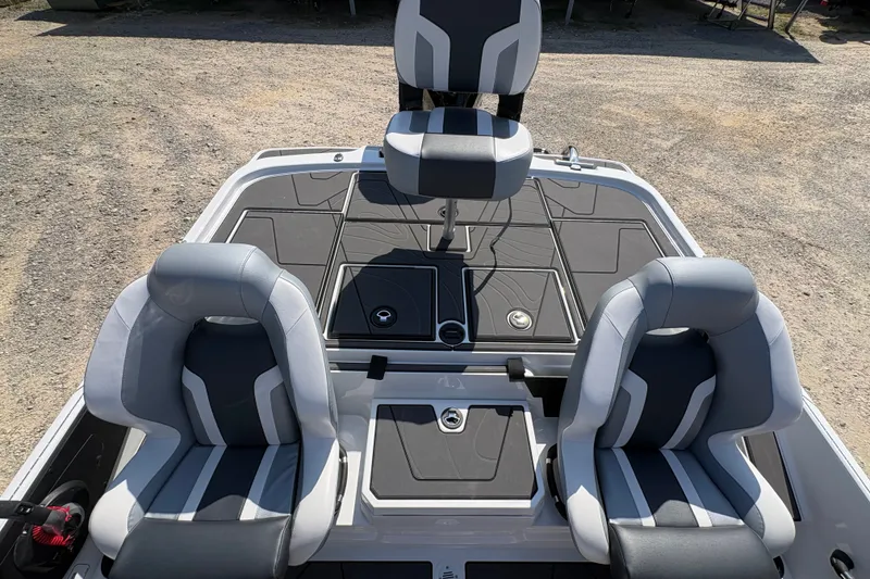 Slide: The Image of 2027 Nitro Z20 XL Pro boat interior with three gray and black seats. - 13