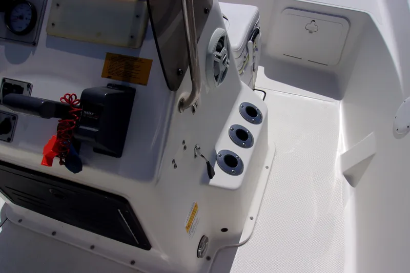 Slide: The Image of Interior view of a 2010 Key West 196 Bay Reef boat console and seating area. - 9