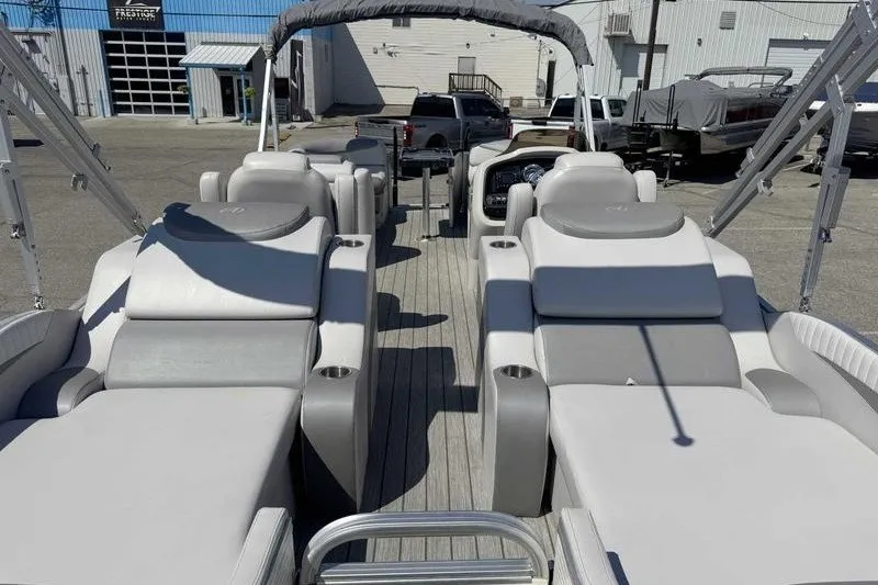 Slide: The Image of 2019 Avalon Catalina Rear Lounge 25' pontoon boat with plush seating and modern design. - 1
