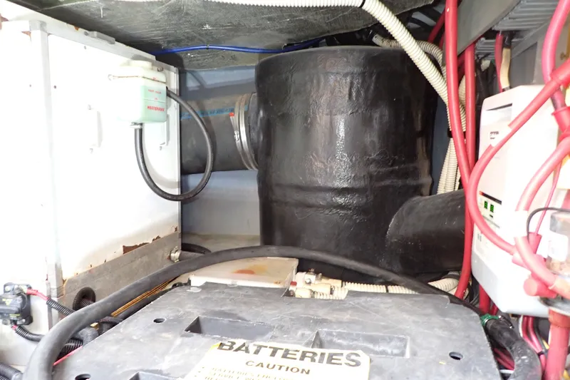 Slide: The Image of Engine room of 1998 Sea Ray 480 Sedan Bridge with battery and wiring. - 204