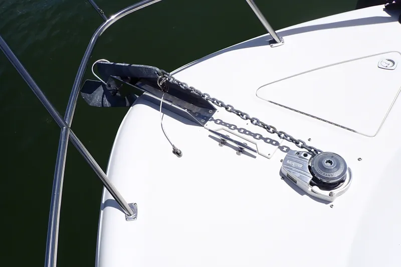 Slide: The Image of Anchor and chain mechanism on 1998 Sea Ray 480 Sedan Bridge yacht. - 94