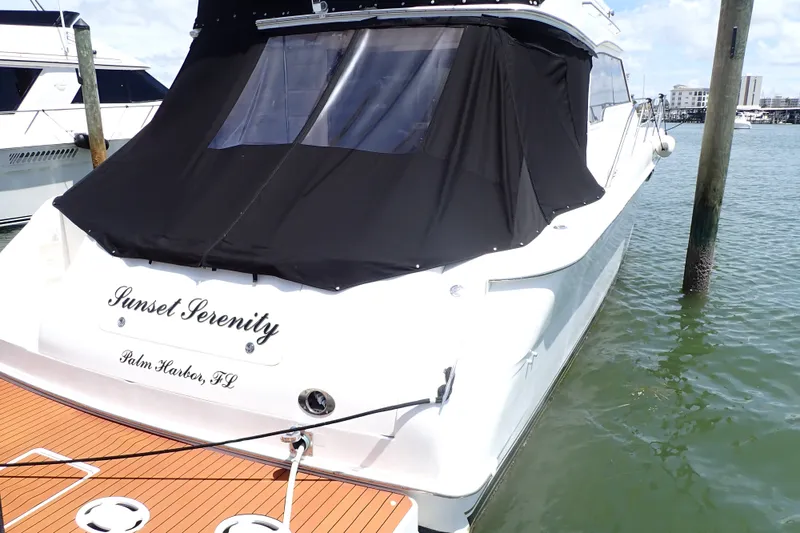Slide: The Image of 1998 Sea Ray 480 Sedan Bridge yacht named "Sunset Serenity" docked in Palm Harbor, FL. - 3