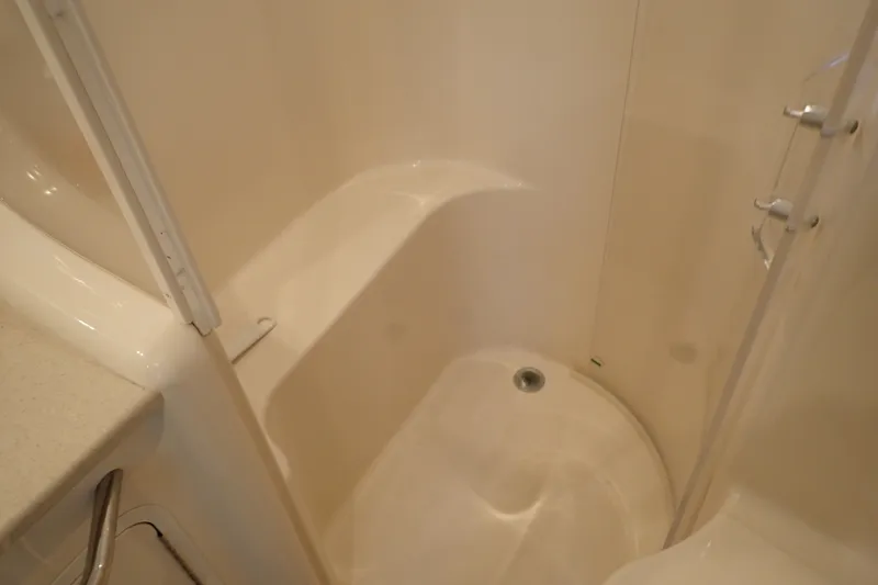 Slide: The Image of Shower area in 1998 Sea Ray 480 Sedan Bridge yacht bathroom. - 37