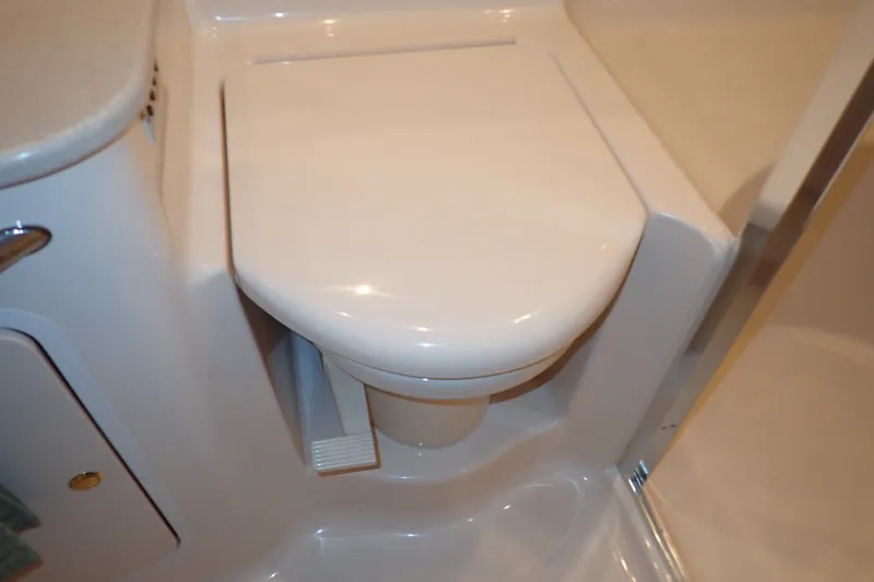 Slide: The Image of Toilet in 1998 Sea Ray 480 Sedan Bridge yacht bathroom. - 157