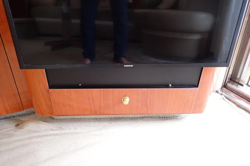 Slide: The Image of Entertainment system with Samsung TV on 1998 Sea Ray 480 Sedan Bridge yacht. - 126