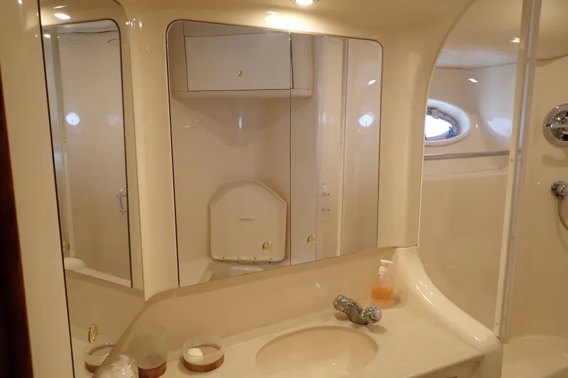 Slide: The Image of Luxurious bathroom interior of 1998 Sea Ray 480 Sedan Bridge yacht. - 174