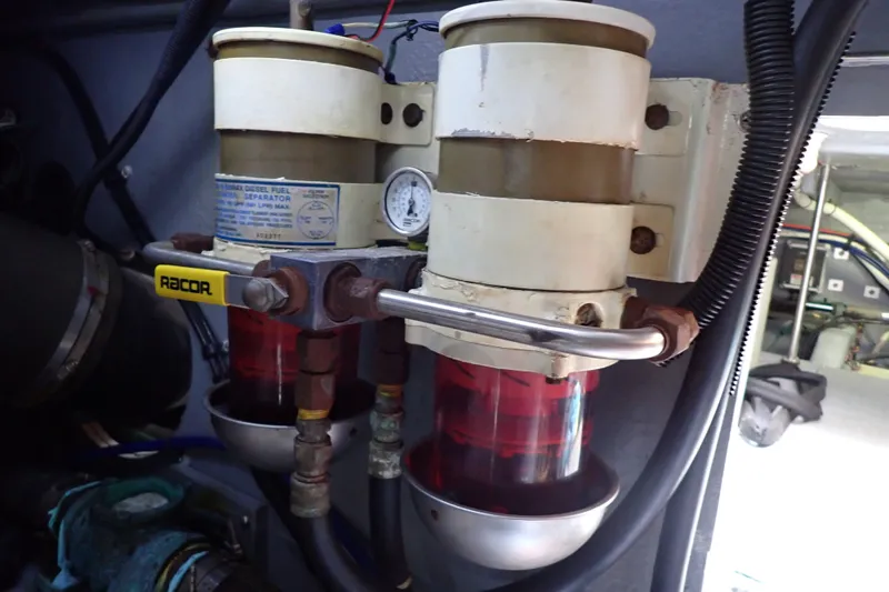 Slide: The Image of Fuel filter system in a 1998 Sea Ray 480 Sedan Bridge engine room. - 196