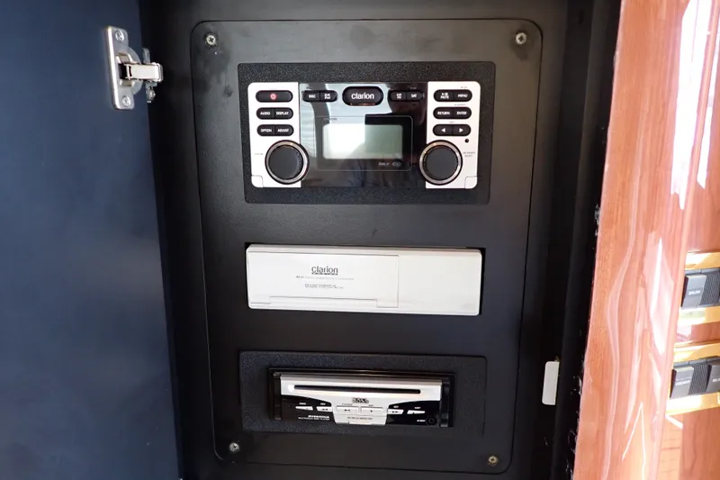 Slide: The Image of Audio control panel on a 1998 Sea Ray 480 Sedan Bridge yacht. - 99