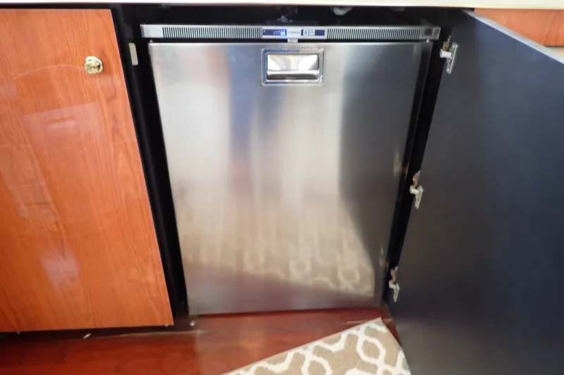 Slide: The Image of Stainless steel refrigerator in 1998 Sea Ray 480 Sedan Bridge yacht kitchen. - 108