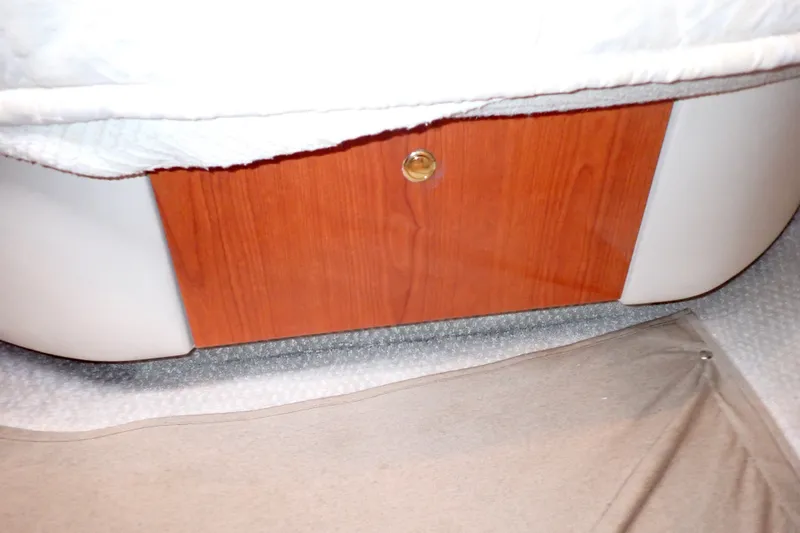 Slide: The Image of Wooden cabinet detail on 1998 Sea Ray 480 Sedan Bridge yacht interior. - 143