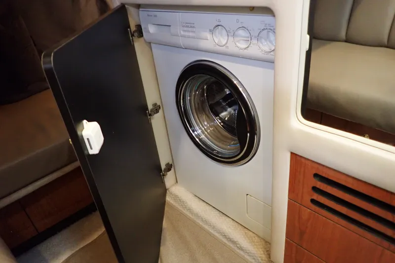Slide: The Image of Washing machine inside 1998 Sea Ray 480 Sedan Bridge yacht cabin. - 152