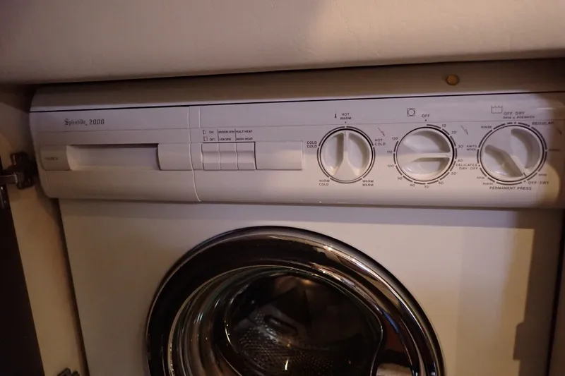Slide: The Image of Splendide 2000 washer-dryer control panel inside 1998 Sea Ray 480 Sedan Bridge yacht. - 153