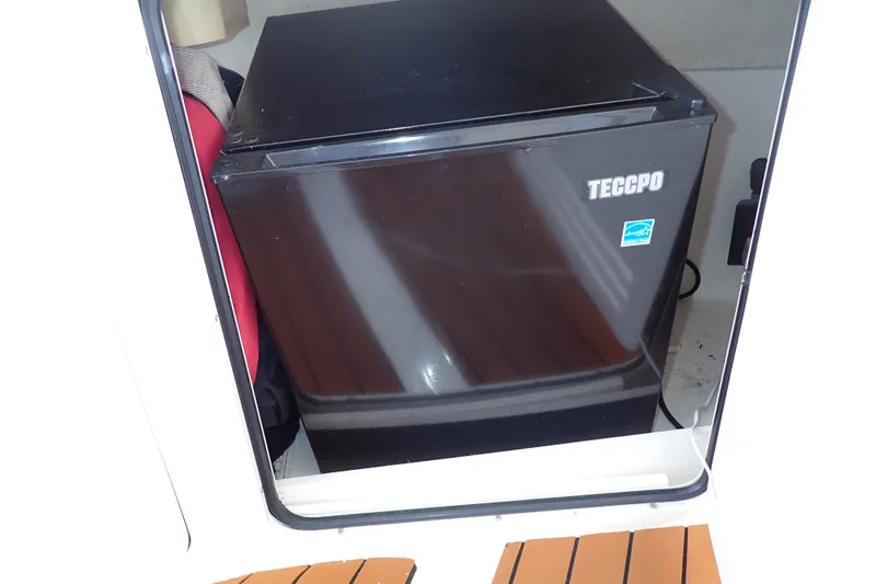 Slide: The Image of Mini fridge inside 1998 Sea Ray 480 Sedan Bridge yacht cabin. - 60