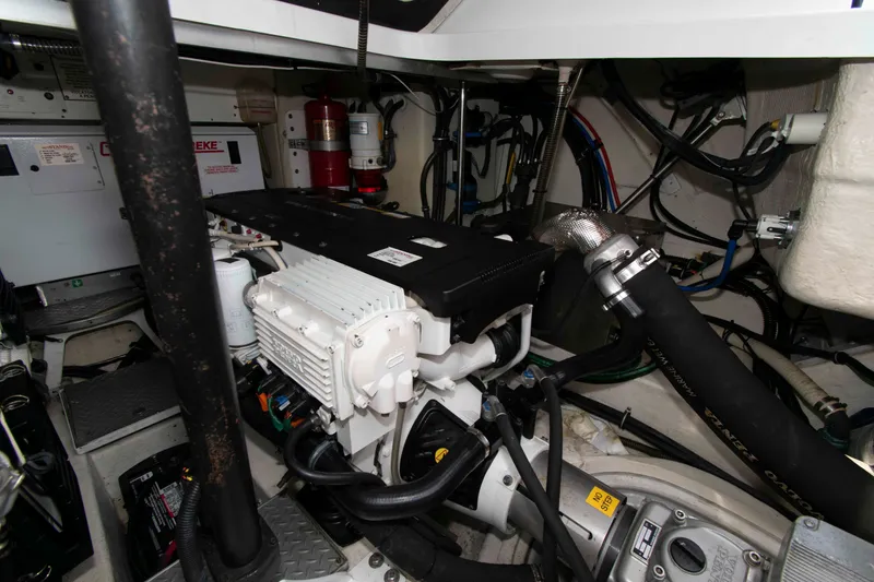 Slide: The Image of Engine room of a 2014 Formula 40 Performance Cruiser, showcasing mechanical components. - 21